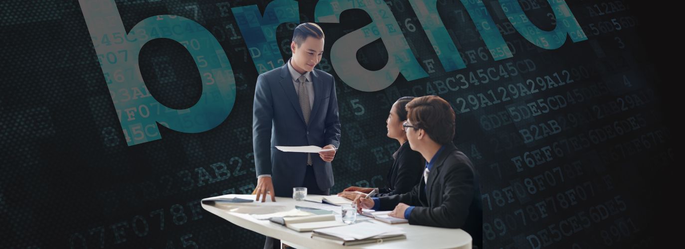 Illustration of branding elements like logo, colors, and typography displayed on digital and print platforms