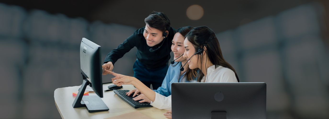 Professionals working in a modern coworking space in Antipolo, using shared desks and private meeting rooms