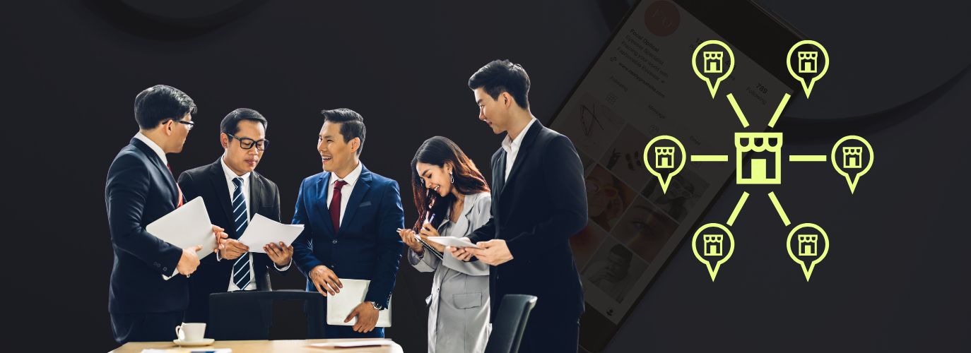 Franchise marketing team managing social media for multiple locations using a central dashboard